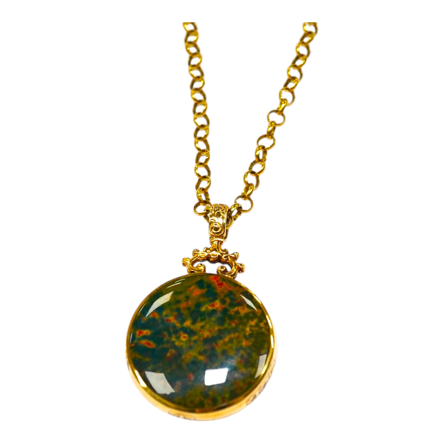 A modern 9ct gold mounted hardstone set circular pendant, 32mm, on a 9ct chain, 60cm, gross weight 38.7 grams. Condition - fair